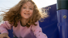Girl in pink sweater