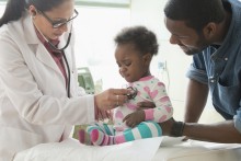 Baby with Doctor and parent